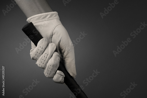 Closeup of a Golfers Gloved Hand on Club