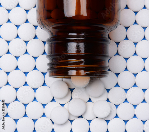Aspirin in Rows With Bottle on Top