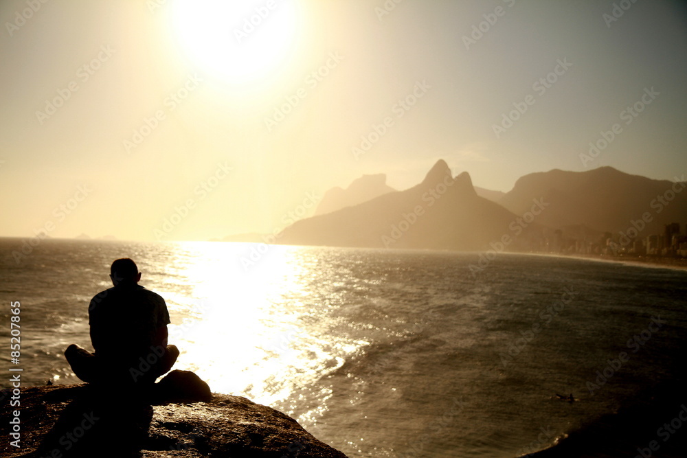 Photo of beautiful sunset taken from Arpoador in Rio de Janeiro, Brazil.