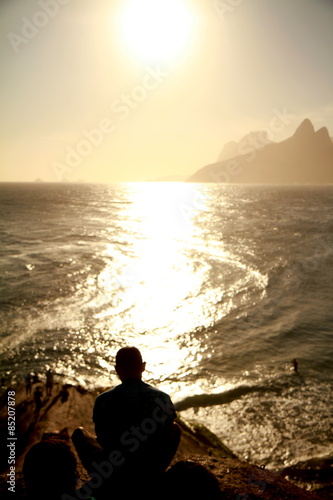 Photo of beautiful sunset taken from Arpoador in Rio de Janeiro, Brazil.