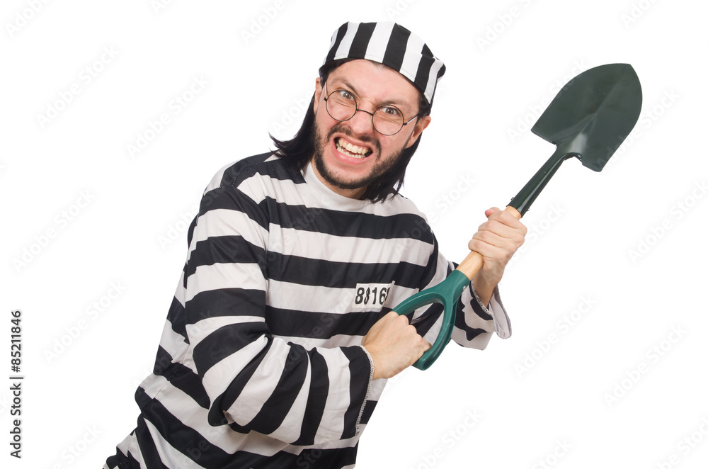 Prison inmate with spade isolated on white