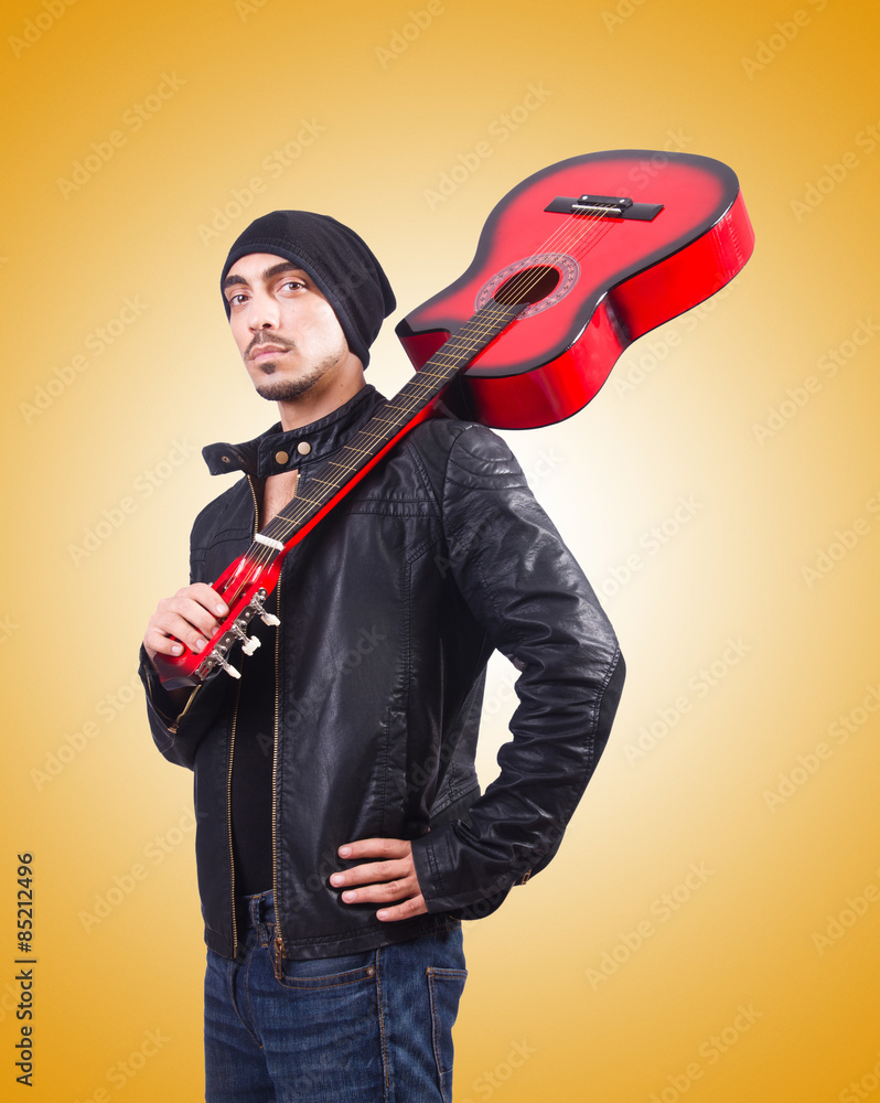 Guitar player against the gradient Guitar player against the gradient