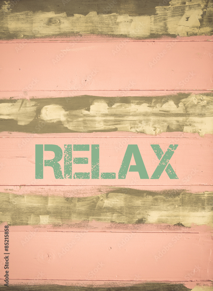 Fototapeta premium RELAX written on vintage painted wooden wall