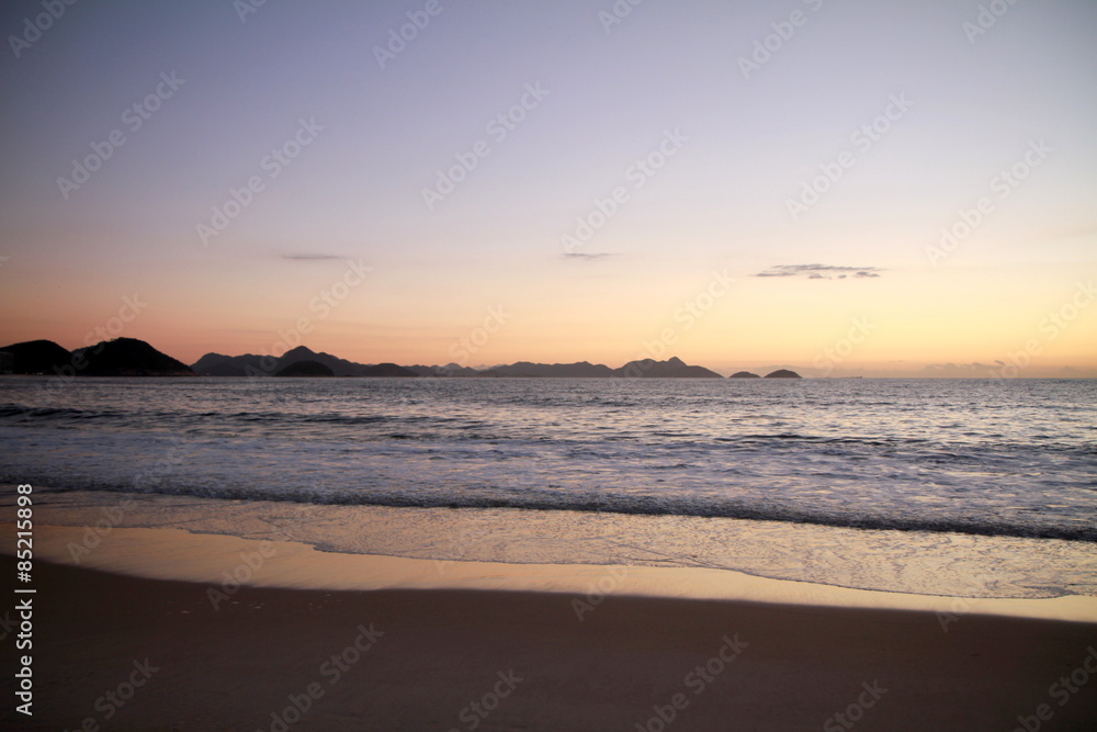 Photo taken during sunrise at Copacabana beach in Rio de Janeiro, Brazil. 