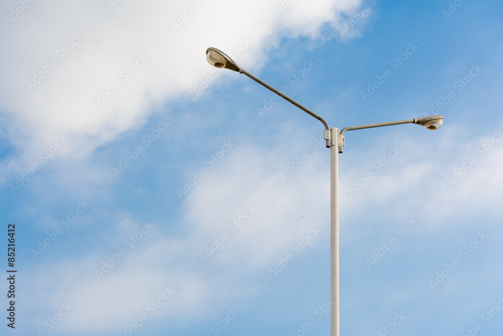 Street light lamp with blue sky background.