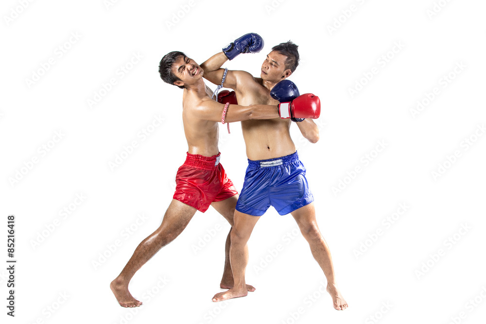 Two thai boxers exercising traditional martial art Two thai boxers exercising traditional martial art