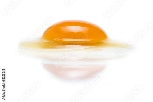 raw egg with a whole yolk photo