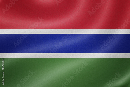 Gambia flag on the fabric texture background © sakda2527
