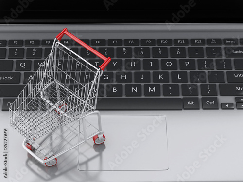 3d Shopping cart on Laptop. e-commerce concept