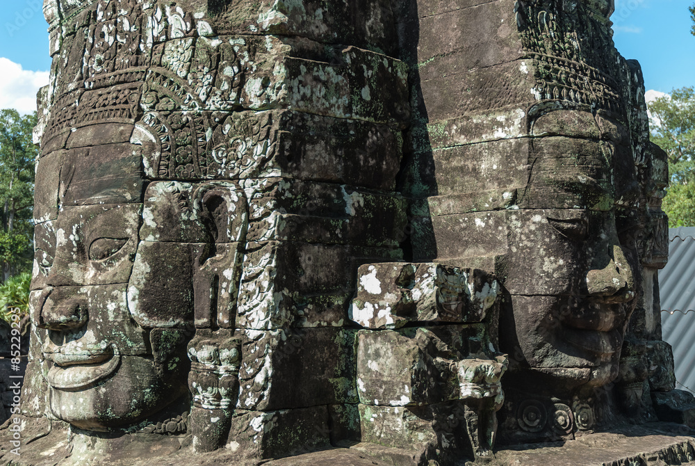 buddha statue inside a prasat in the complex of the bayon in the archaeological angkor thom place in siam reap, cambodia