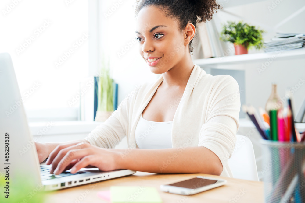 Enjoying her work in office. Enjoying her work in office.