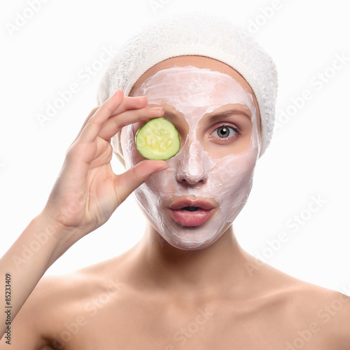 young woman with a face pack.