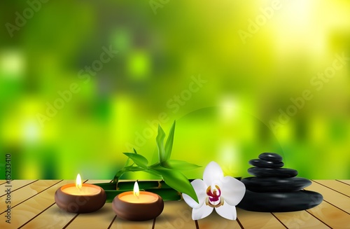 Stone, flower, wax and leaf on the table background