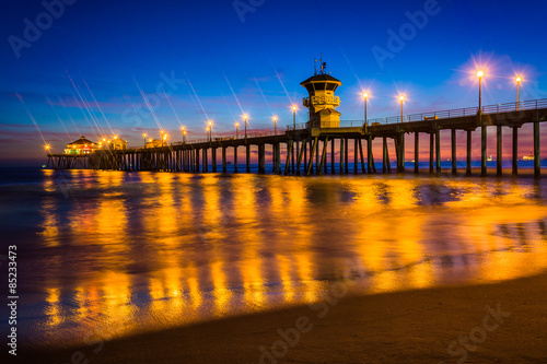The pier at night, in Huntington Beach, California. © jonbilous