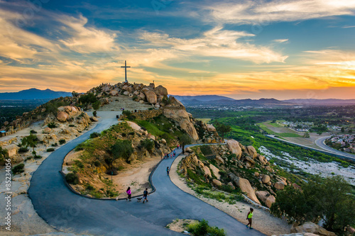 The cross and trails at sunset, at Mount Rubidoux Park, in River © jonbilous