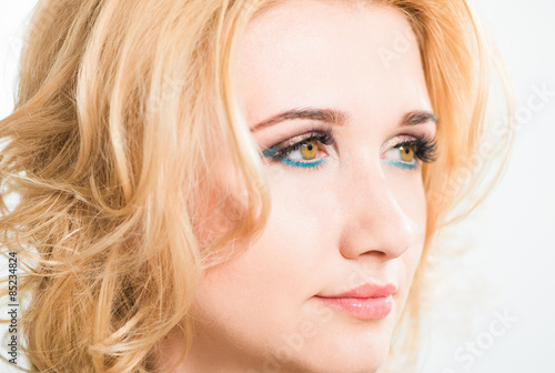 young woman portrait with makeup on face