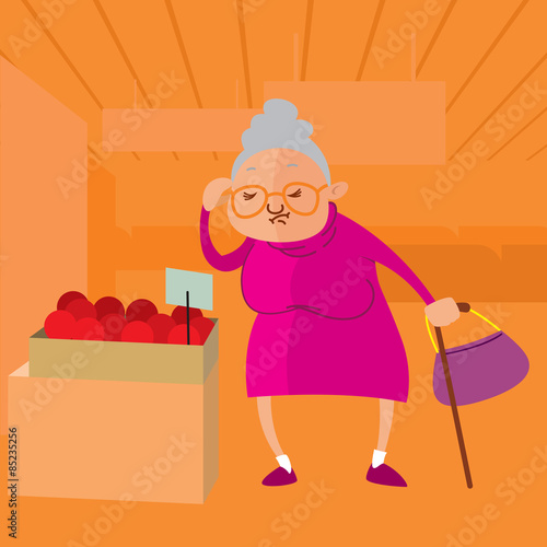 Senior woman choosing fruits