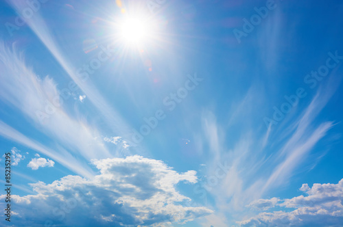 Blue sky, clouds and sun