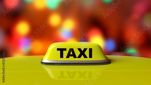 Yellow taxi car roof sign with abstract bokeh city lights background
