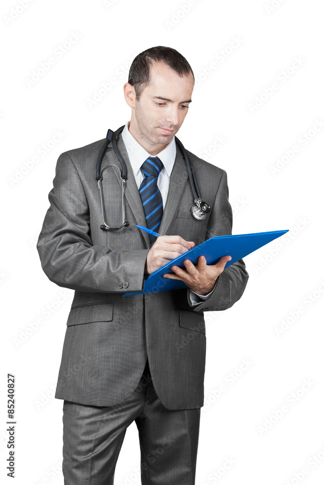 Doctor with stethoscope writes diagnosis Doctor with stethoscope writes diagnosis