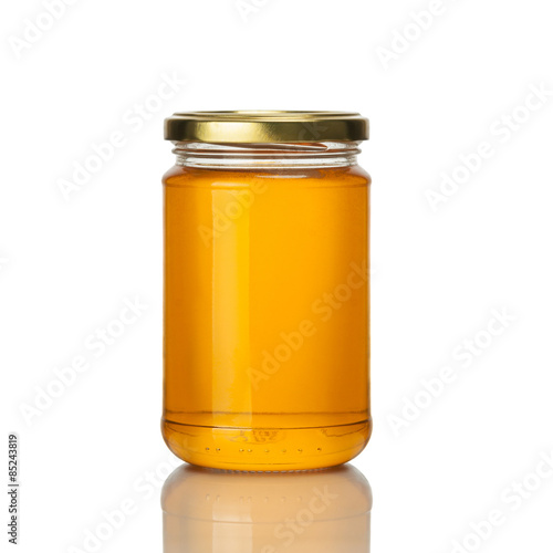 honey jar on white background