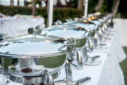 Buffet Table with Row of Food Service Steam Pans