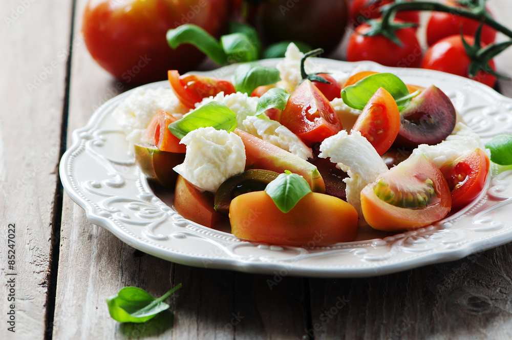 Traditional italian antipasto caprese with mozzarella Traditional italian antipasto caprese with mozzarella
