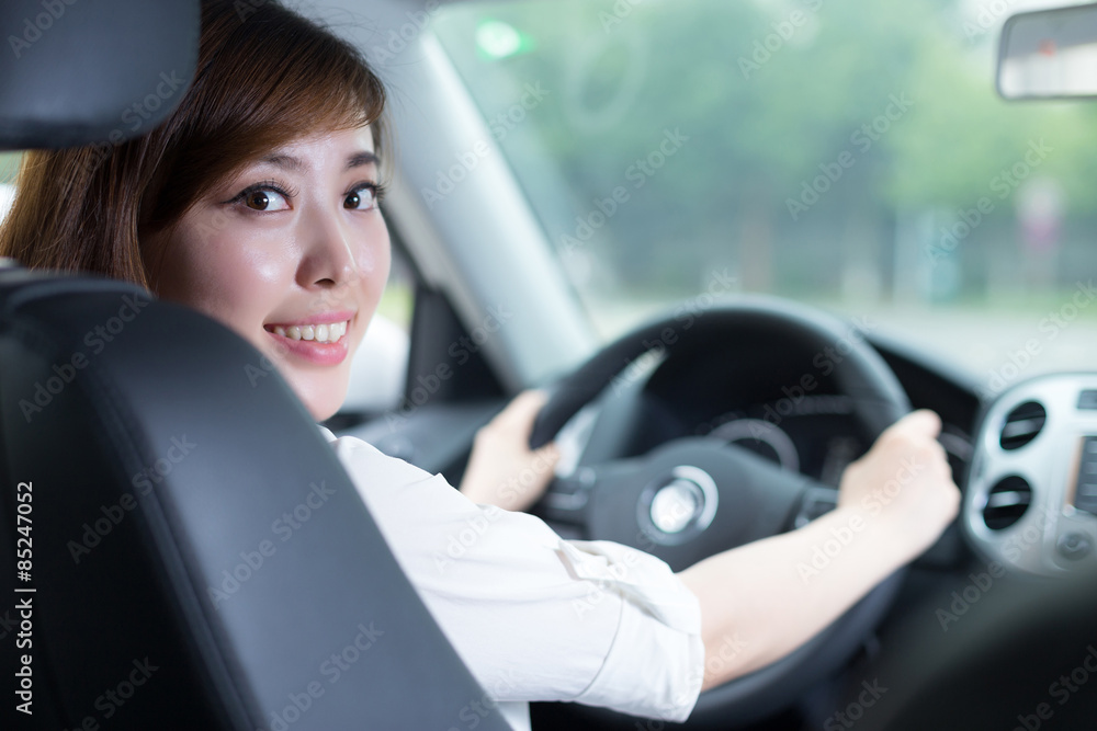 Asian beautiful woman driving car portrait