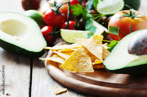 Fotografie Concept of mexican food with raw vegetables