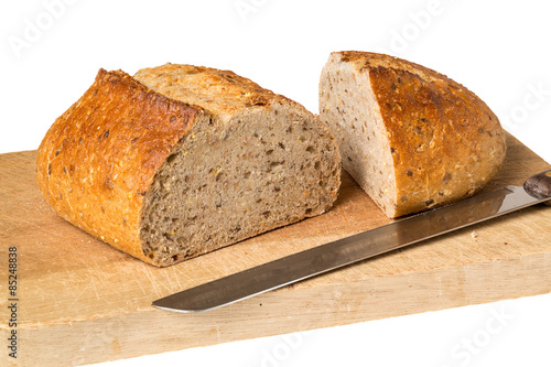 Artisan whole wheat bread on breadboard