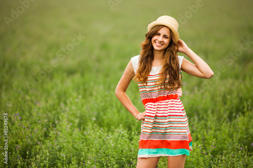 Portrait of happy girl in wheat field