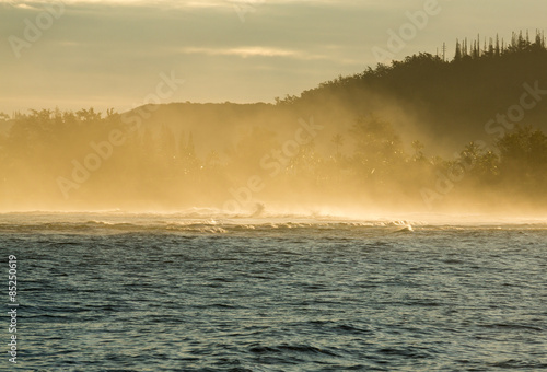 Waves create spray at dawn at Hanalei
