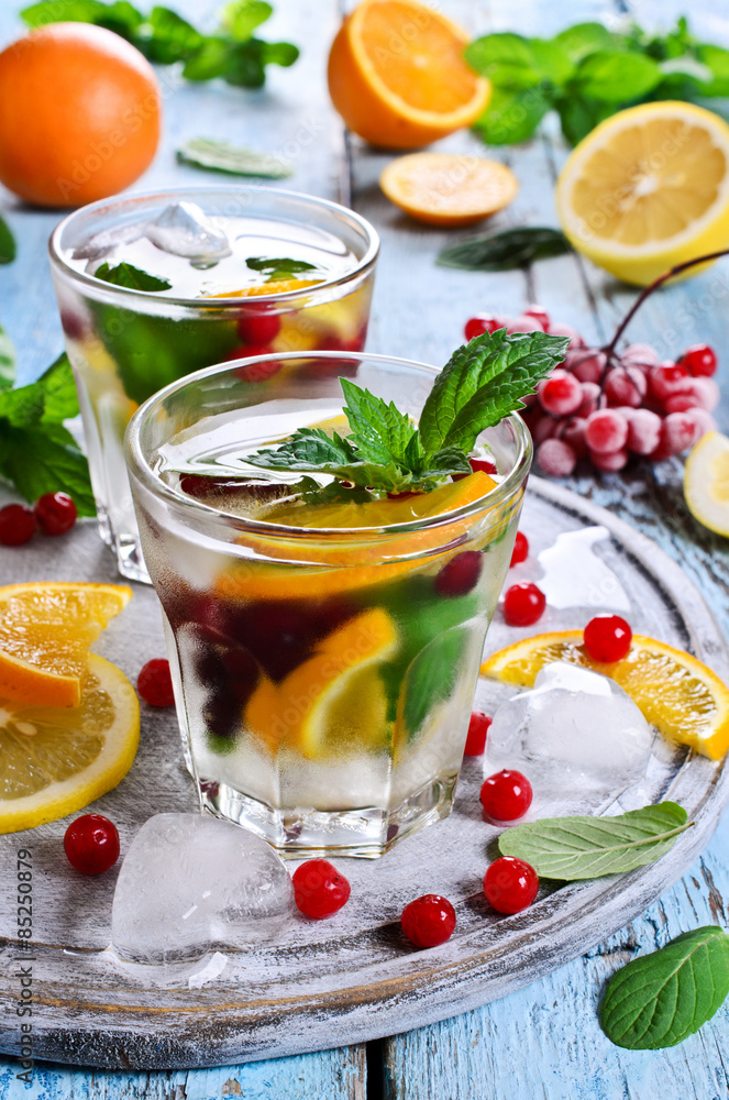 Drink with citrus and berries Drink with citrus and berries