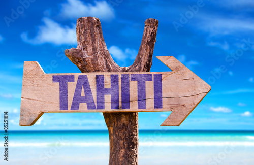 Tahiti wooden sign with beach background