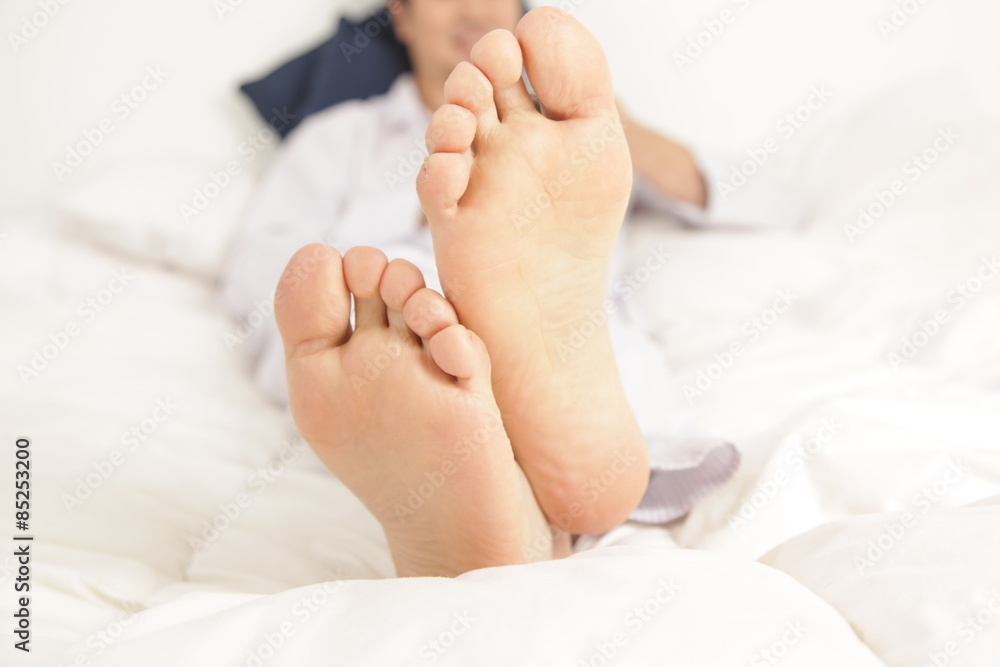 Man lying on the bed Man lying on the bed
