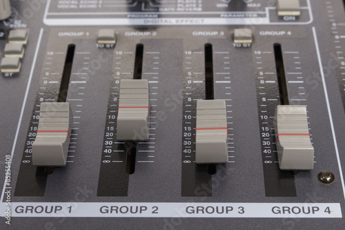 Close-up zone of subgroup and mix routing in an audio mixer photo