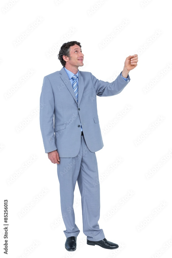 Businessman presenting with hand Businessman presenting with hand