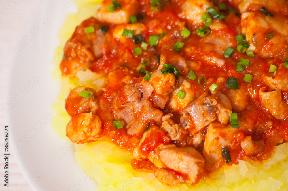 meat in tomato sauce with mashed potatoes meat in tomato sauce with mashed potatoes