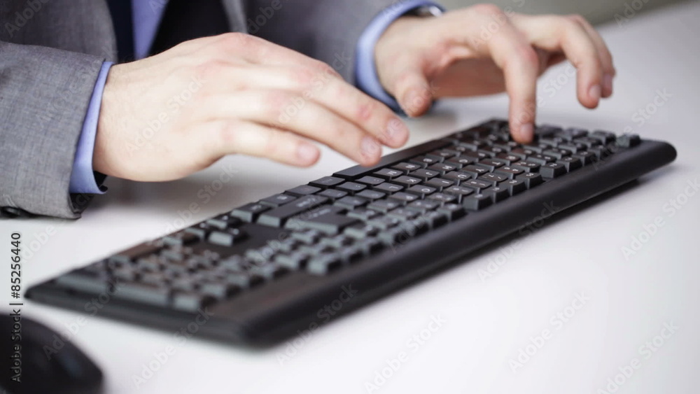 close up of businessman hands typing on keyboard close up of businessman hands typing on keyboard