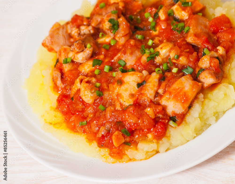 meat in tomato sauce with mashed potatoes meat in tomato sauce with mashed potatoes