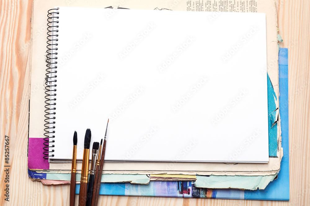 Blank notebook and brushes Blank notebook and brushes