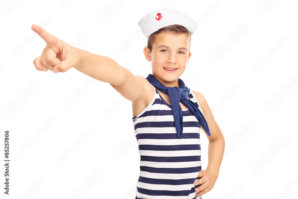 Little kid in a sailor costume pointing forward Little kid in a sailor costume pointing forward