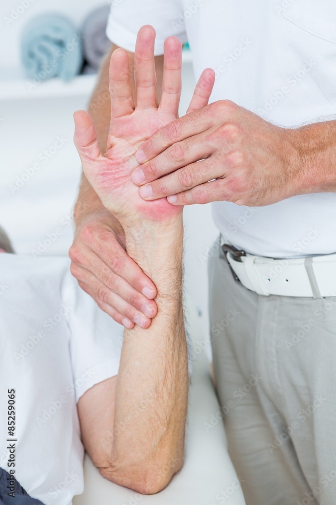 Fototapeta premium Physiotherapist doing hand massage