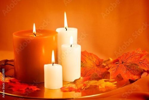Fall and Thanksgiving themed Autumn Candles with silk maple leaves. 