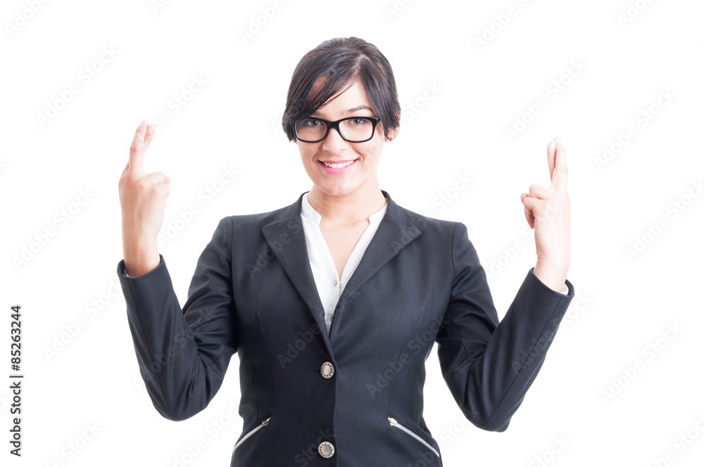 Business woman wishing for luck with crossed fingers Business woman wishing for luck with crossed fingers