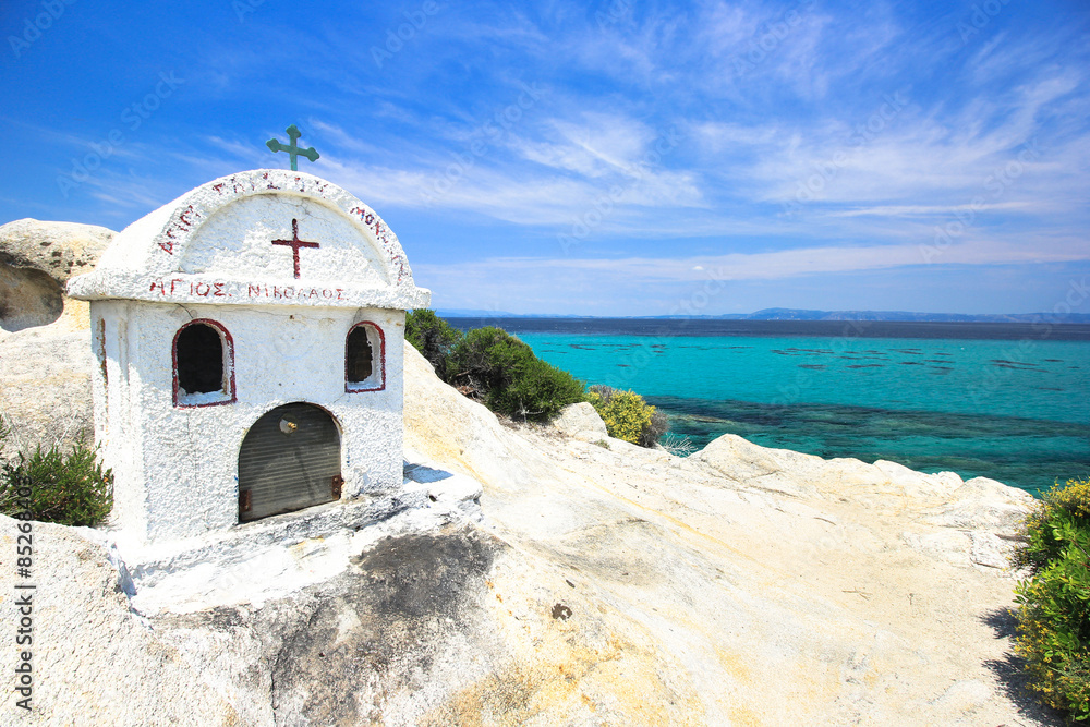 Little church on a rock overlooking the sea, in Sithonia, Chalki