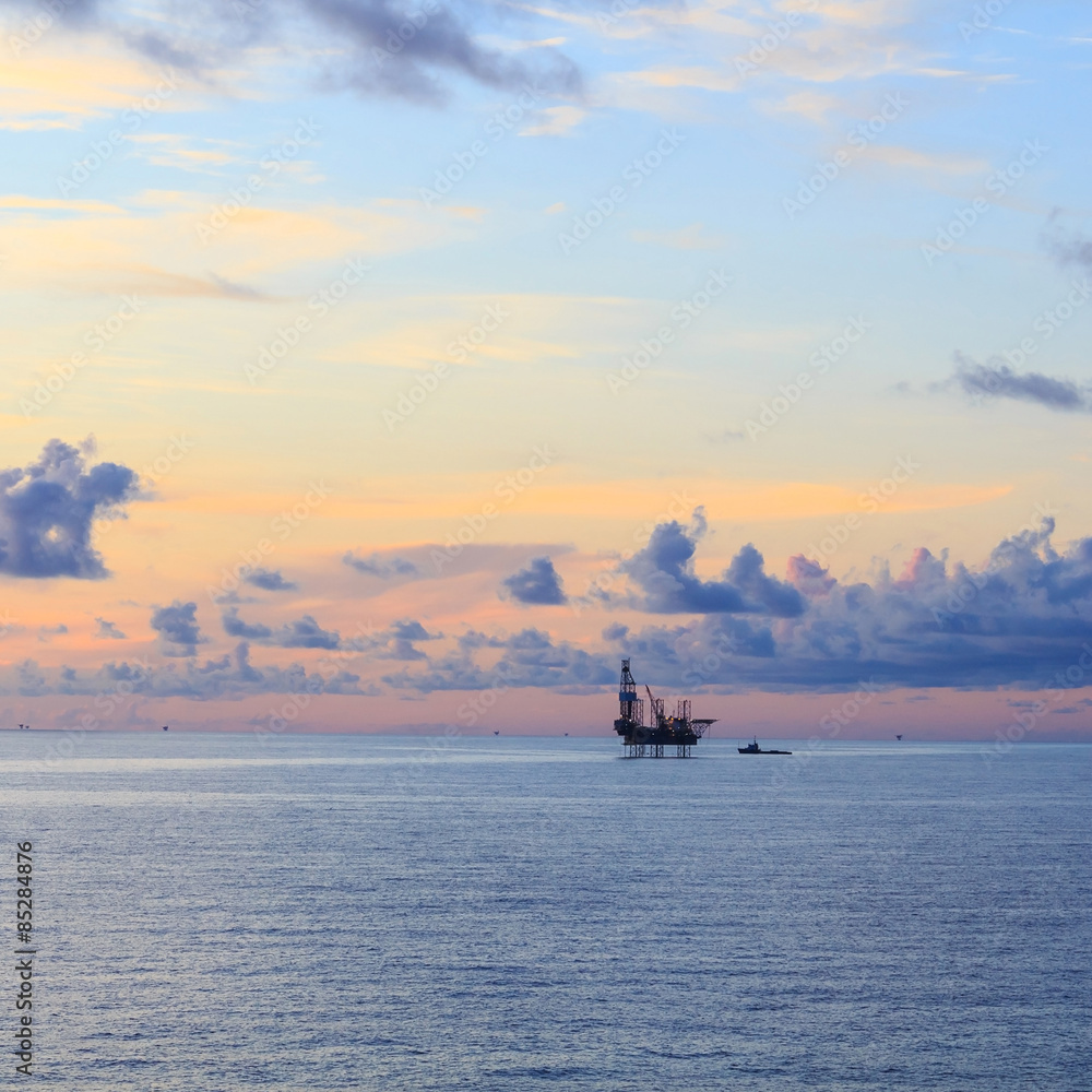 Offshore jack up drilling rig in the middle of the ocean