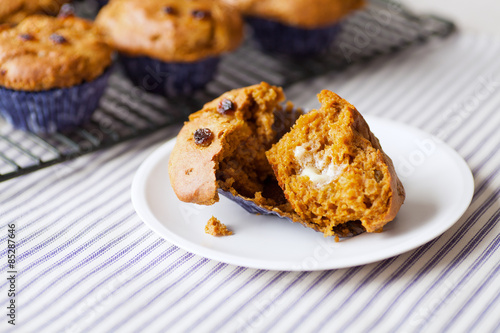 Delicious Gluten-free Pumpkin Spice Muffins with raisins, freshly baked. 