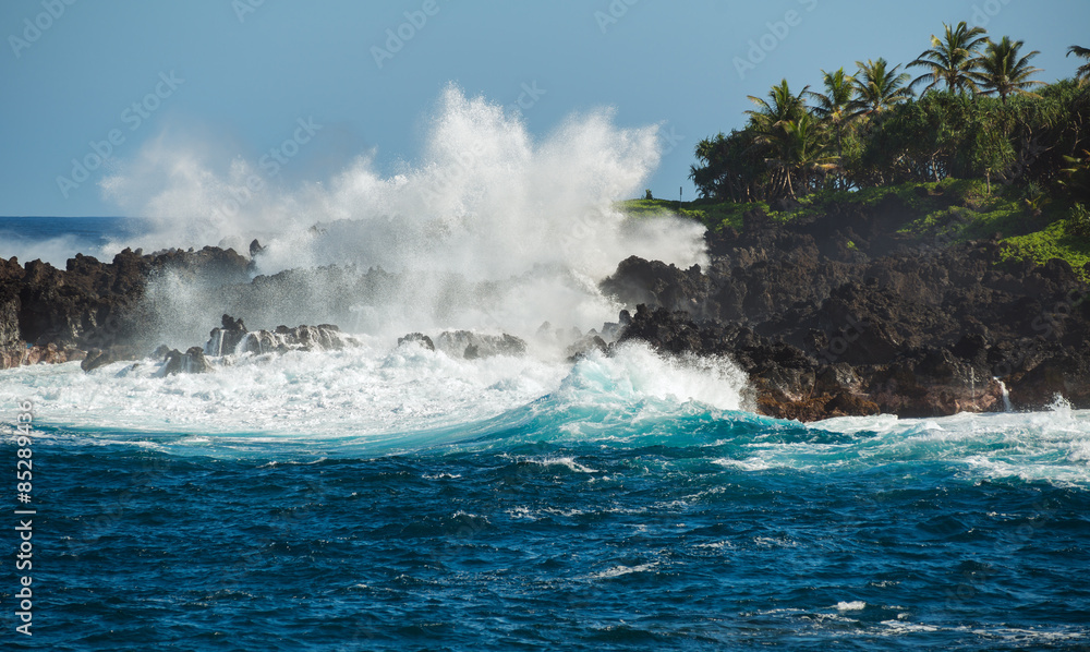breaking of waves at hana maui hawaii