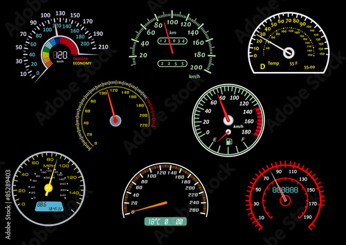 Glowing speedometers isolated on black background